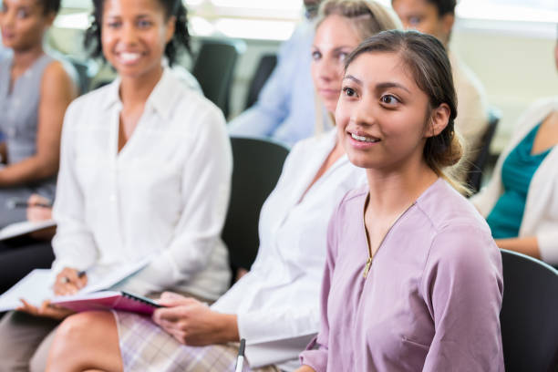 istock Attentive woman attending seminar 1193583593
