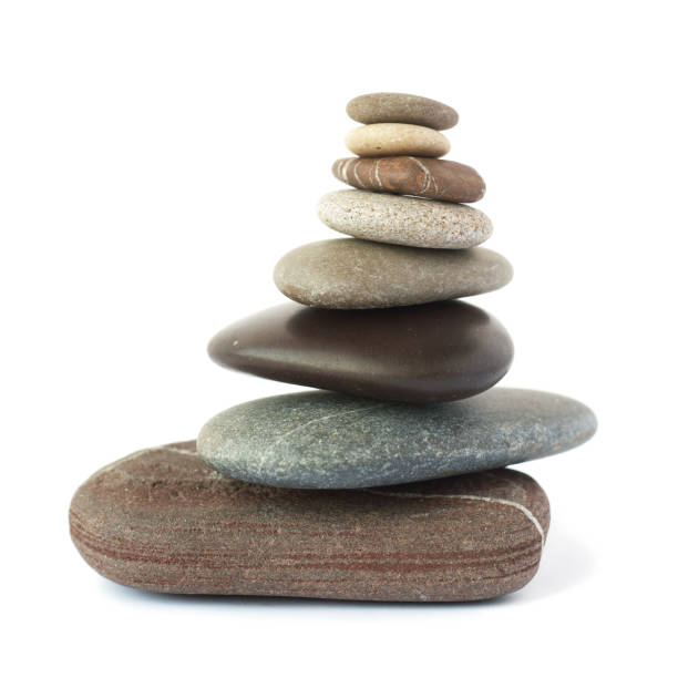 istock Pebble stones tower isolated on white background. 119358584