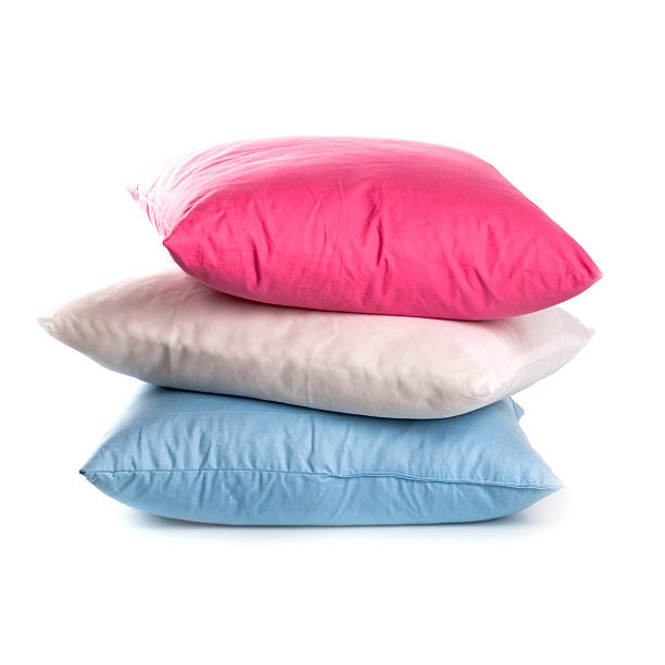 pink, white and blue pillows stock photo