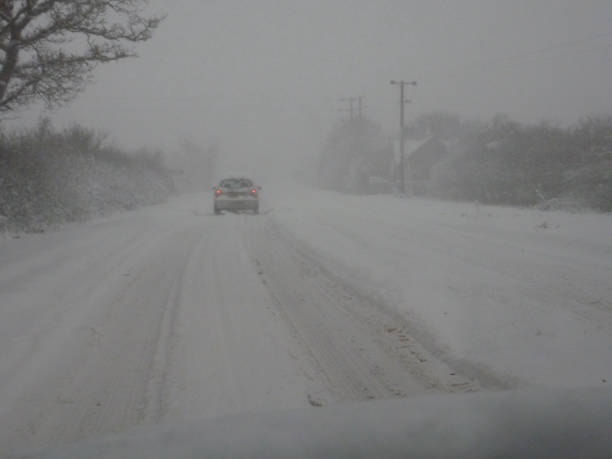 istock Driving in a snow storm 1193589217