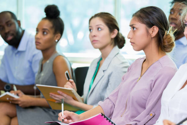 istock Business people take notes during meeting 1193589513