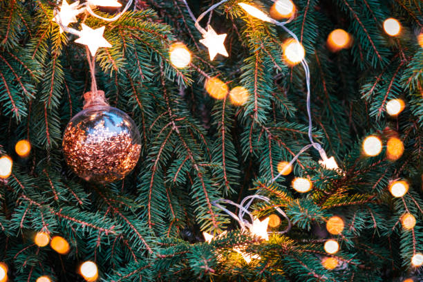 istock Beautiful Christmas tree with golden balls. 1193589655