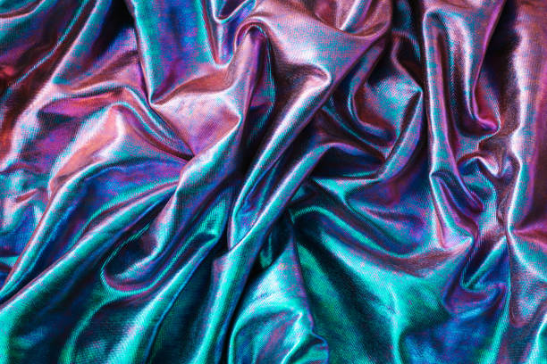 istock Abstract iridescent holographic texture wrinkled material. 1193589677