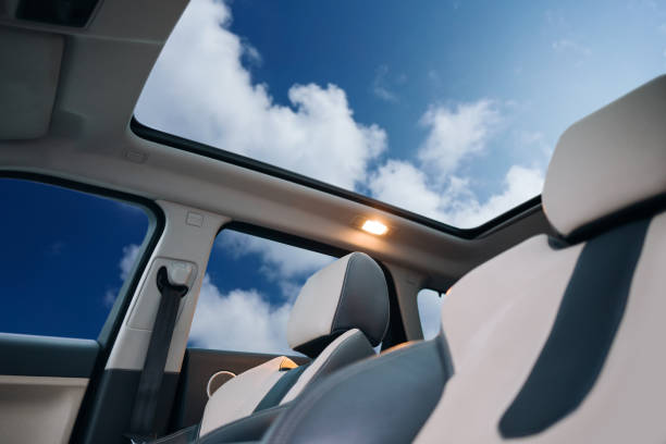 Panoramic sun roof in the car Panoramic sun roof in the car vehicle accessory stock pictures, royalty-free photos & images