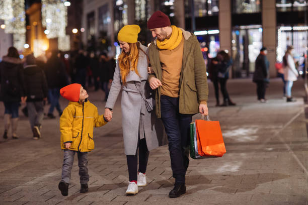 istock Parents walking with their son 1193602631