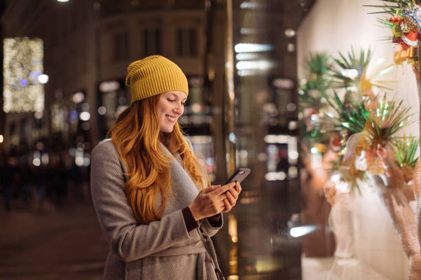 istock Women holding phone 1193602695