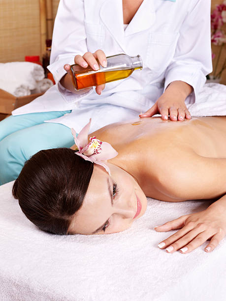 istock Young woman on massage table in beauty spa. 119360313