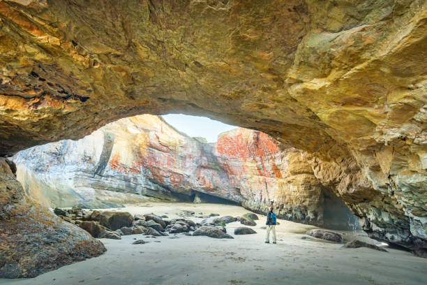 Hiker at Devils Punchbowl State Park Oregon USA