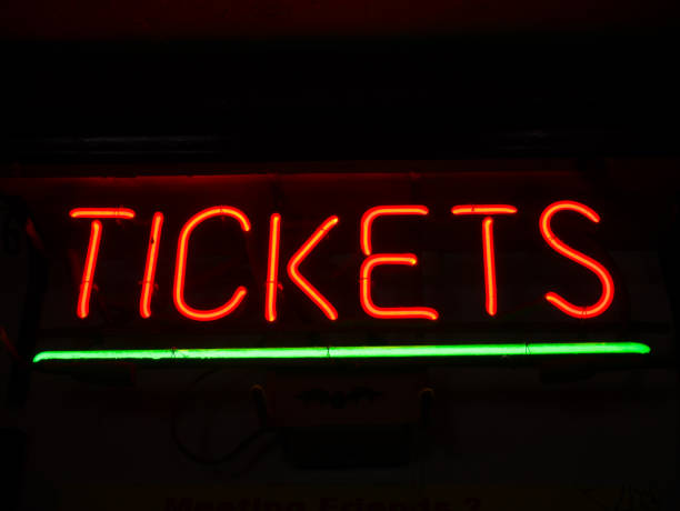 istock Glowing red neon tickets sign 1193603755