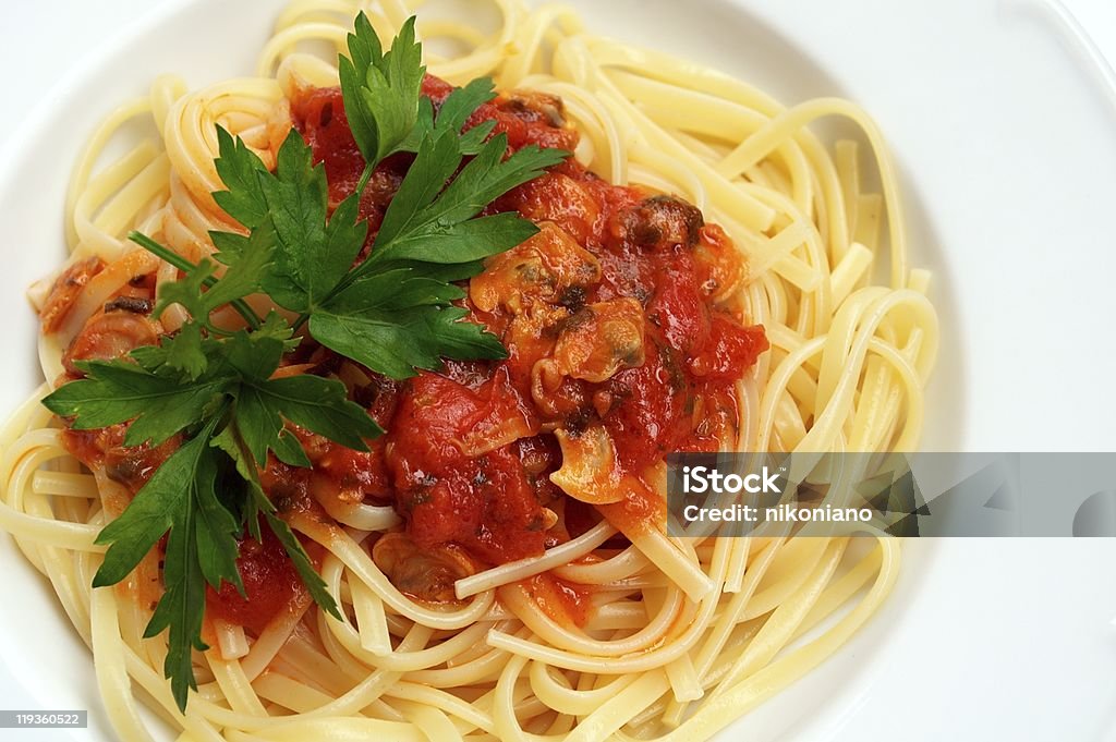 Linguine with Clams and Tomato Sauce  Clam - Seafood Stock Photo