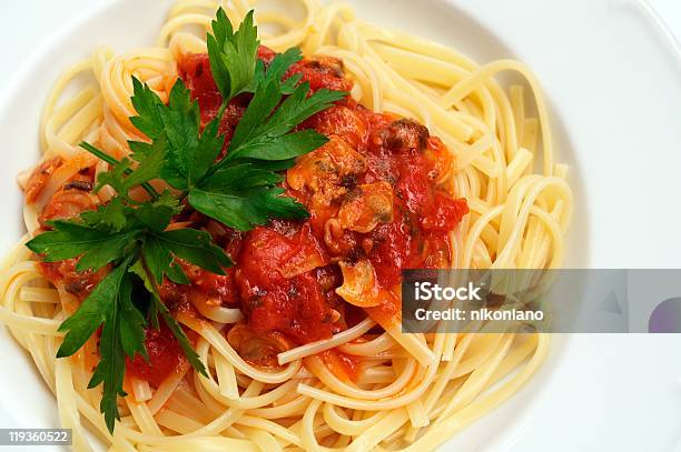 Linguine With Clams And Tomato Sauce Stock Photo - Download Image Now - Clam - Seafood, Pasta, Savory Sauce