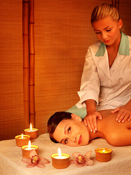 istock Young woman on massage table in beauty spa. Series. 119360816