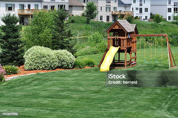 Back Yard Wooden Swing Set Stock Photo - Download Image Now - Suburb, Yard - Grounds, Residential Building