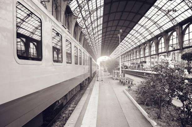 istock Passenger train stands by the platform before departure. 1193613136