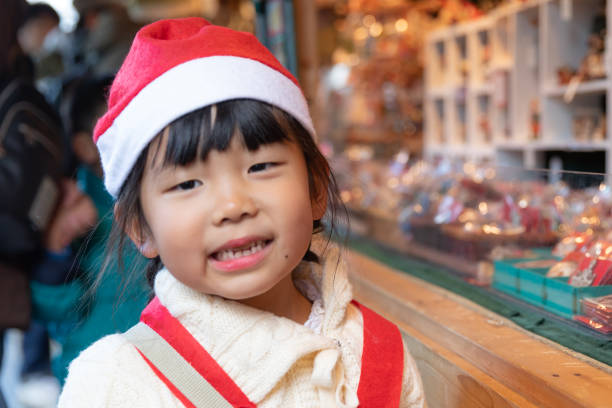 Small child enjoying Christmas market