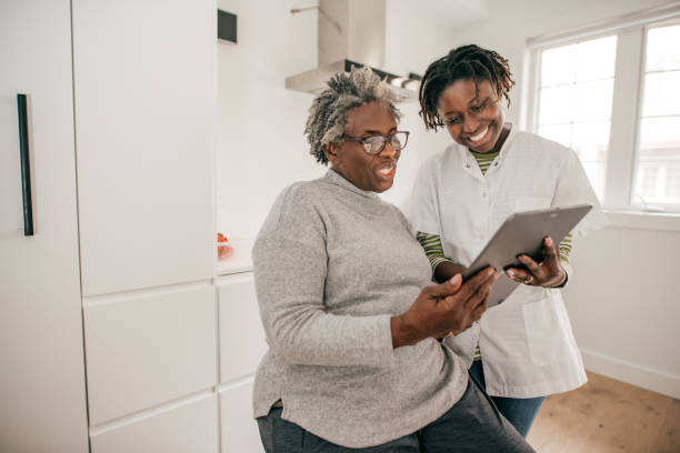 istock Home caregiver assistance 1193613874