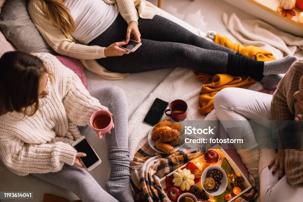 Enjoying Warm Tea In Cozy Sock On A Cold Autumn Day Stock Photo
