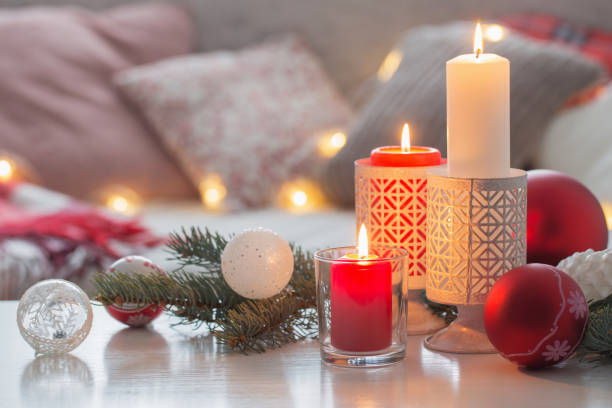 istock Christmas decora with candles and balls on white table indoor 1193614069
