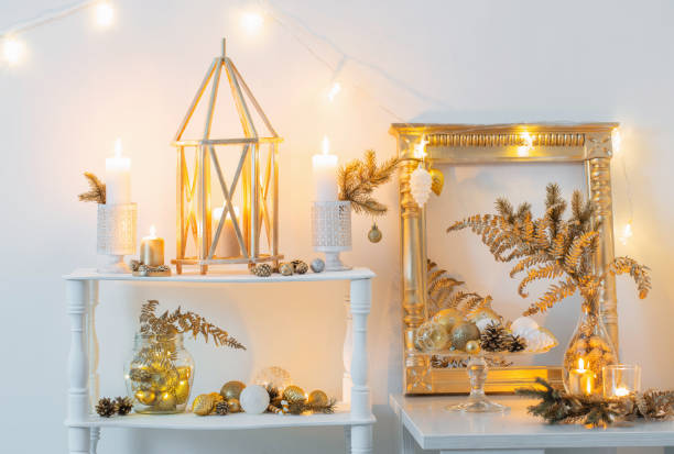 istock Christmas golden decor in white interior 1193614075