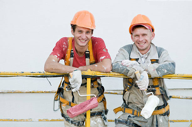 Happy builder facade painters  steeplejack stock pictures, royalty-free photos & images