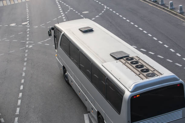 istock tourist bus rides on a multi-lane highway 1193619958