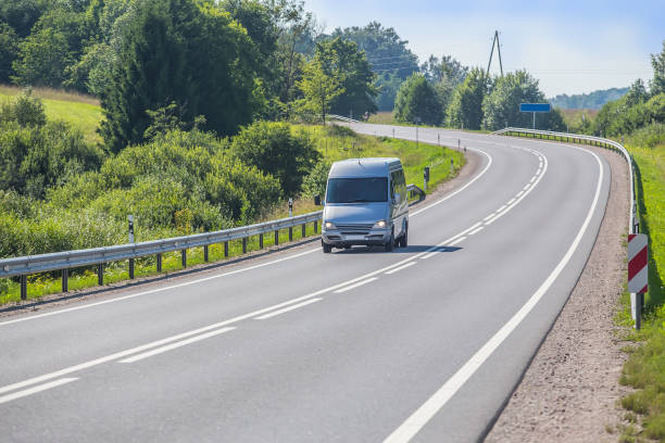 istock minibus goes on the country highway 1193620043
