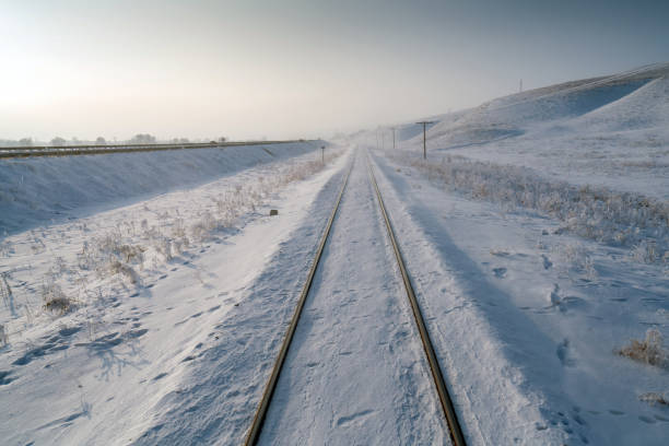 istock railway track at sunrise photo 1193620175