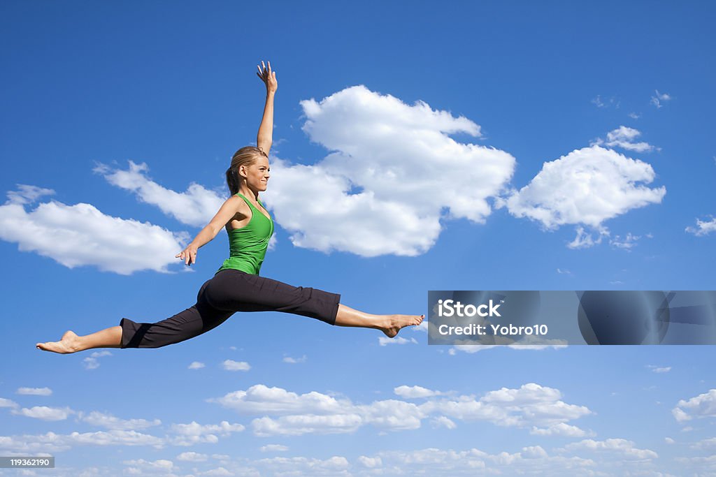 Jumping and Dancing Woman  20-29 Years Stock Photo