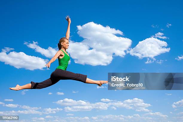 Jumping And Dancing Woman Stock Photo - Download Image Now - 20-29 Years, Activity, Adult