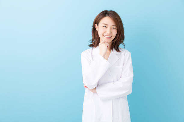 istock asian woman in a white coat 1193624387