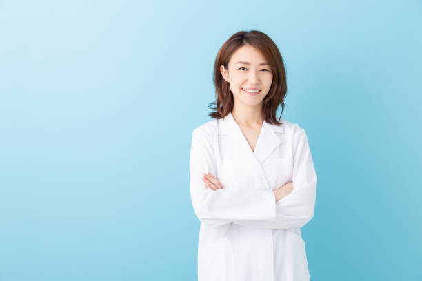 istock asian woman in a white coat 1193624447