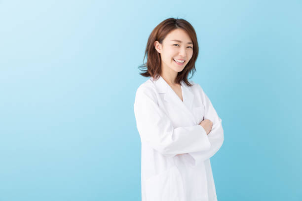 istock asian woman in a white coat 1193624465