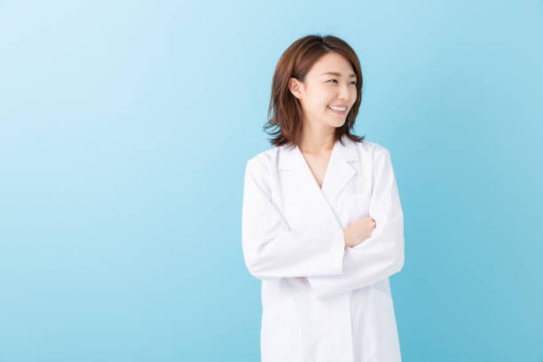 istock asian woman in a white coat 1193624471