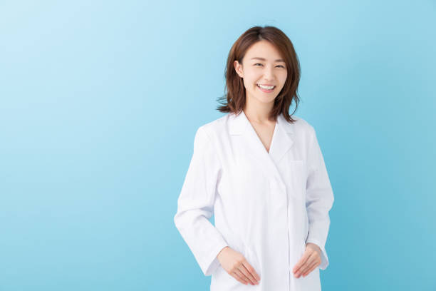 istock asian woman in a white coat 1193624476
