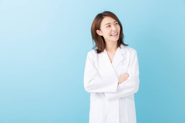 istock asian woman in a white coat 1193625033