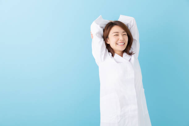 istock asian woman in a white coat 1193625043