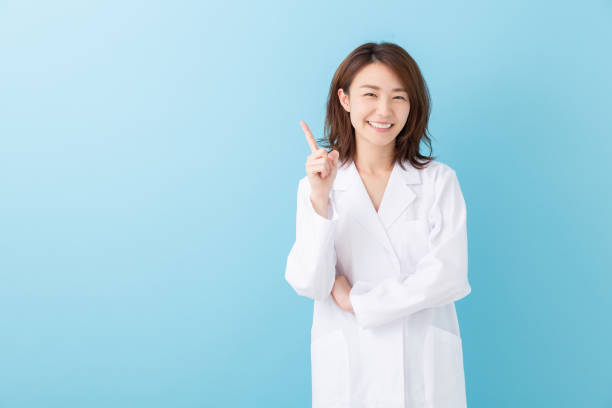 asian woman in a white coat