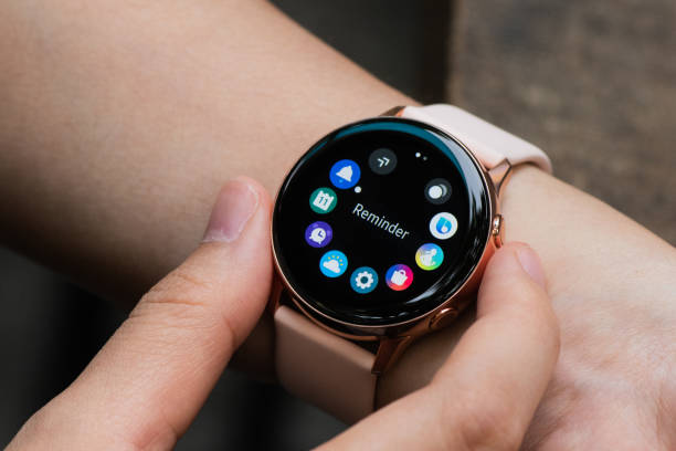 Samsung Galaxy Watch Active 2 December 2019, Ho Chi Minh City, Vietnam - Closeup view of Samsung Galaxy Watch Active on hand, can be used for review purposes. smart watch business stock pictures, royalty-free photos & images