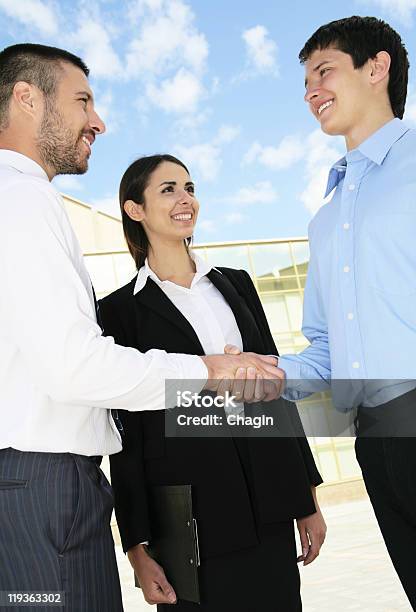 Businesspeople Shake Hands Stock Photo - Download Image Now - Adult, Adults Only, Building Exterior