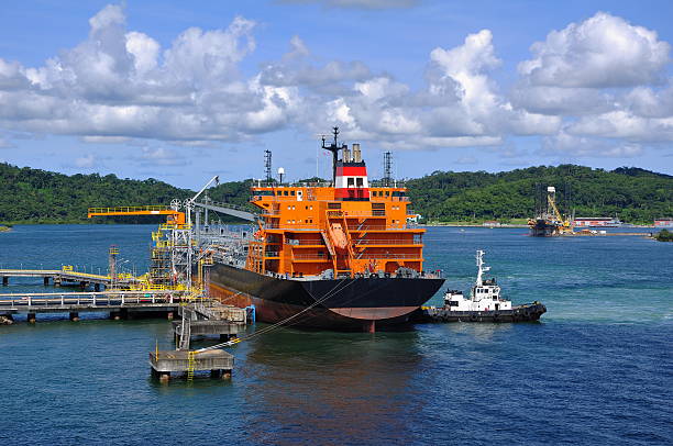 loading of chemical tanker in port stock photo