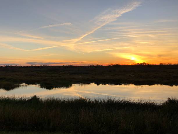 istock reflections of sunset in the river 1193634278