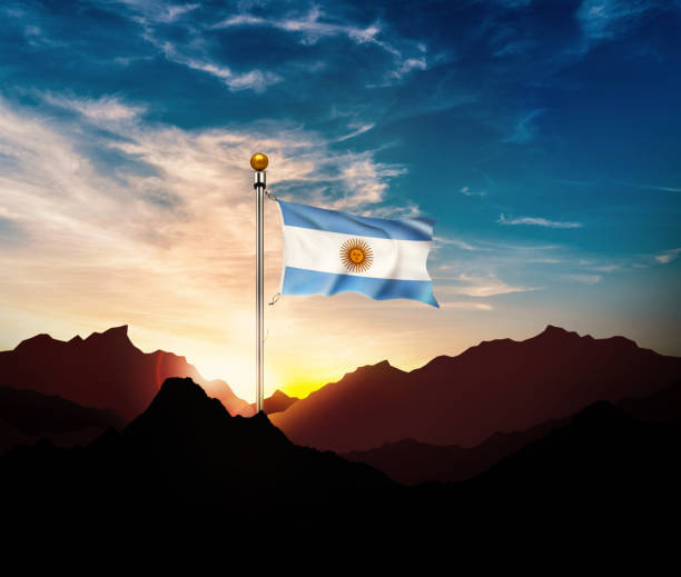 Waving Argentina flag on the mountain in sun light
