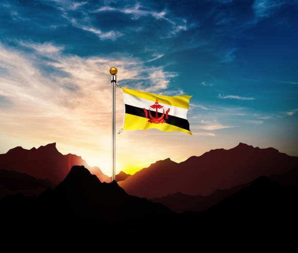 ブルネイ旗、山に旗を振る - brunei flag ストックフォトと画像