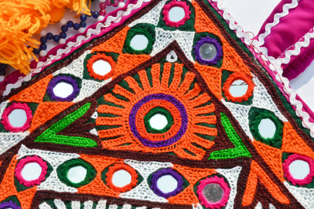 istock Gujarat embroidery close up view,mirror work and patchwork  view,handmade pattern embroidery close up view,artwork on fabric defense color and  need,indian embroidery close up view, 1193642379
