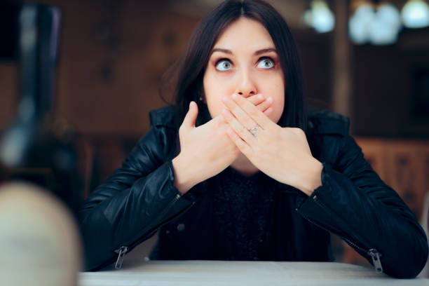 istock Nauseated Woman Feeling Sick at the Restaurant 1193643355