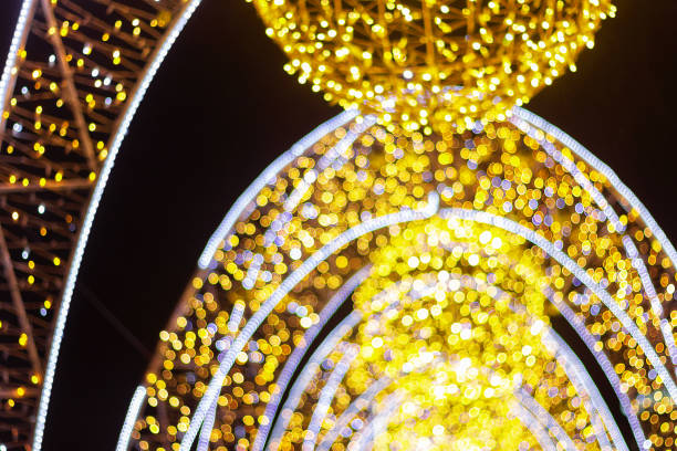 istock illuminated holiday arch blurry bokeh Golden moon color 1193644815