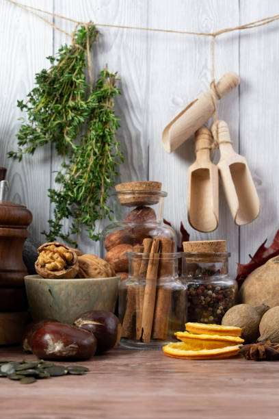 istock Winter autumn  different ingredients for a warming hot tea  white wood background, copy space, top view 1193644831