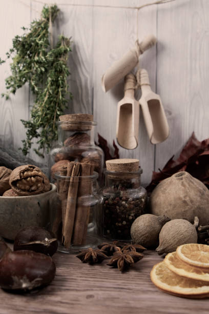 istock Winter autumn  different ingredients for a warming hot tea  white wood background, copy space, top view 1193644842