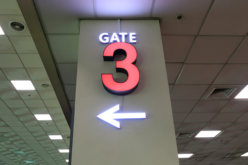 Gate 3 in the airport and arrow