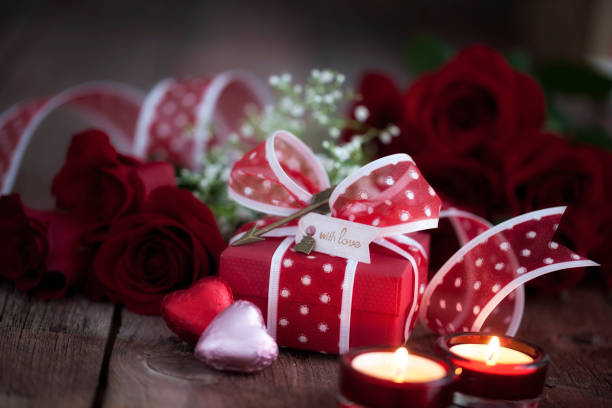istock Valentine's Day Gift with Red Roses, Chocolate Candy and Candlelight 1193649530